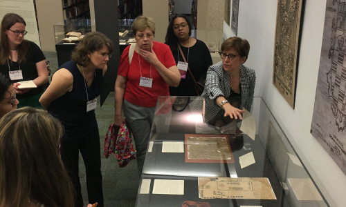 LAL Director Hortensia Calvo giving a tour of the library's Colonial Counterpoint exhibit (2018).