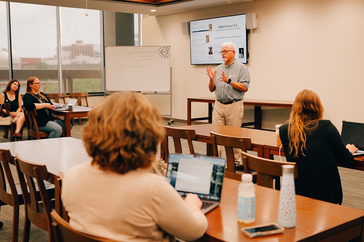 People in classroom  TUSC also hosted an in-person SNACSchool session focused on archival discovery and cross-institutional collaboration,
