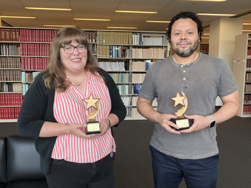 picture of Lori Schexnayder and Alan Velasquez holding their two ARLies awards