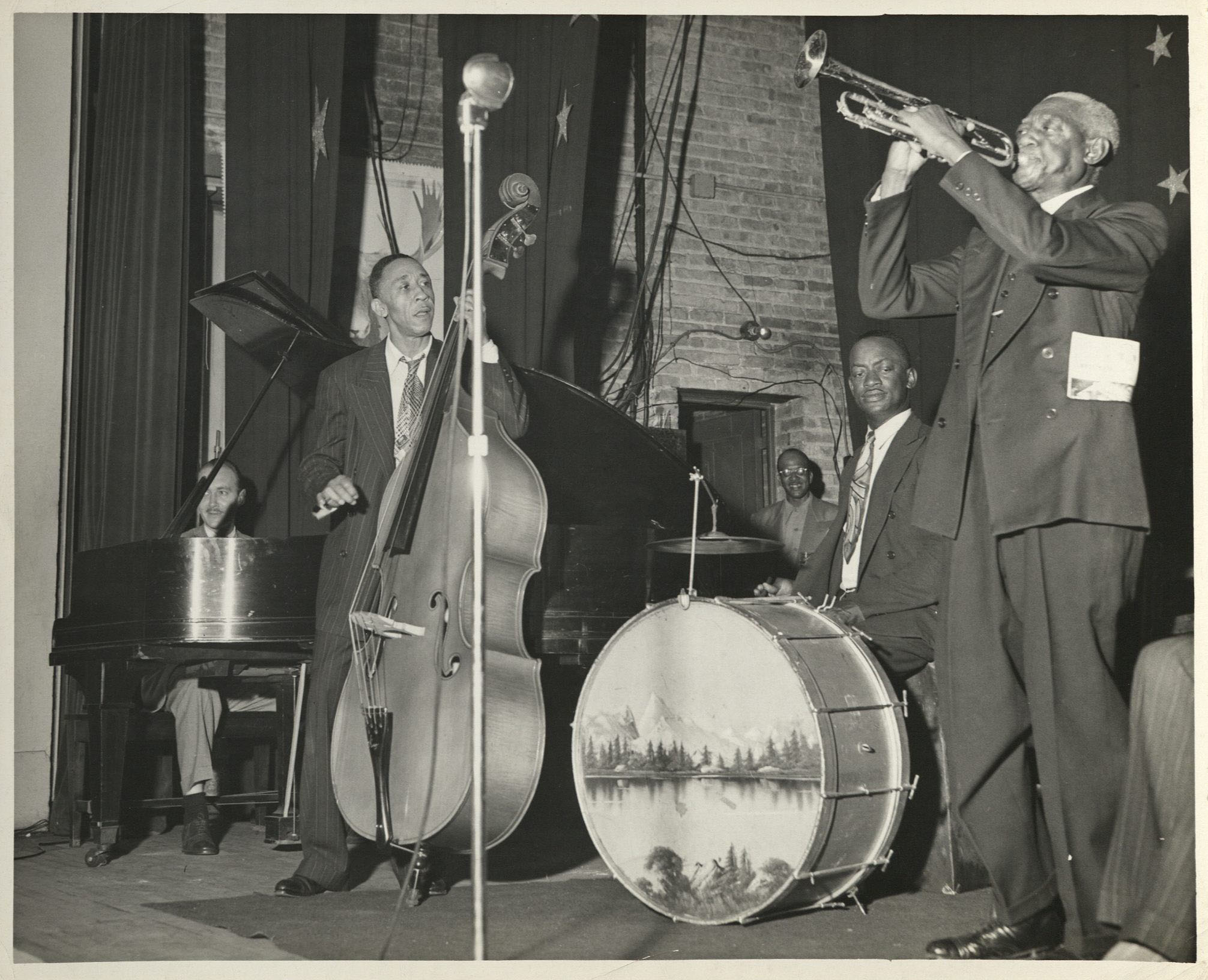 Don Ewell, seated at piano, plays with trumpeter Bunk Johnson and his band, unidentified date and location, photographer: Ward Silver; Don Ewell collection, HJA-005, Tulane University Special Collections, New Orleans, LA.