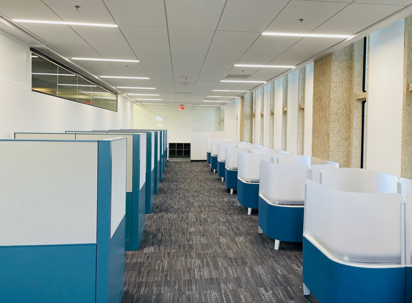 Graduate Study Room with a variety of seating options including open tables, carrels and lounge seating