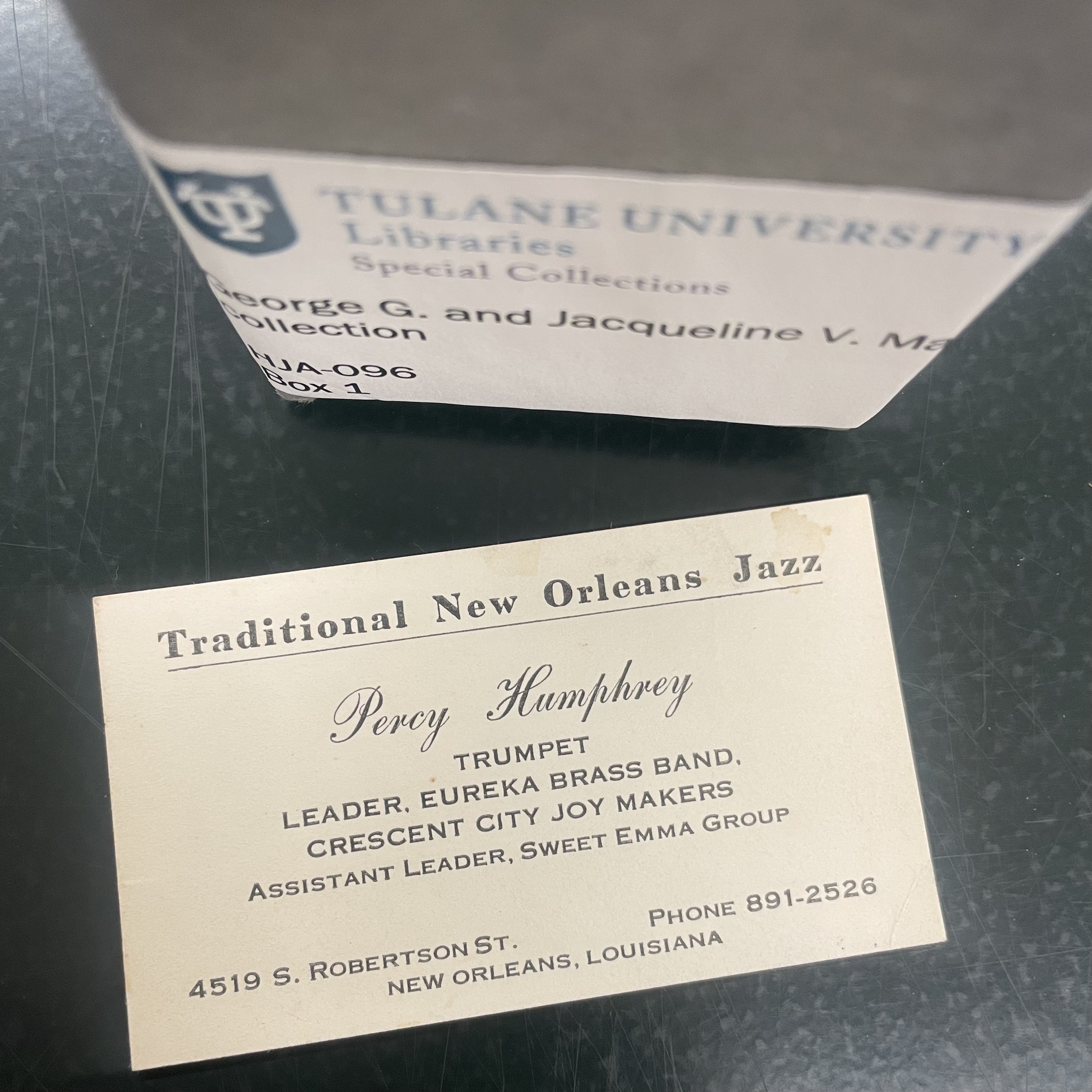 A business card for musician Percy Humphrey (1905-1995), autographed on the back, the George G. and Jacqueline V. Mallinson collection, HJA-096, Tulane University Special Collections.