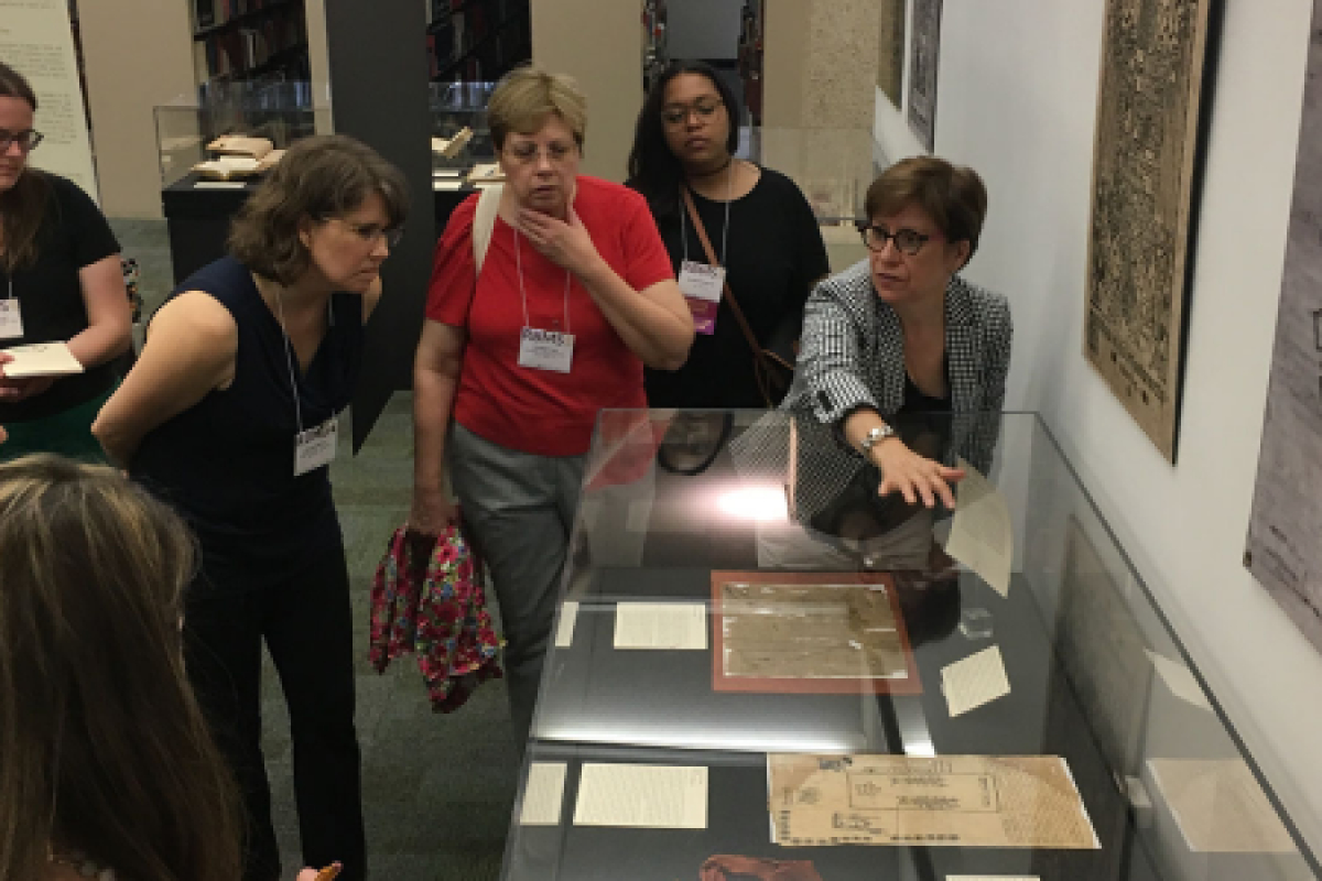LAL Director Hortensia Calvo giving a tour of the library's Colonial Counterpoint exhibit (2018).