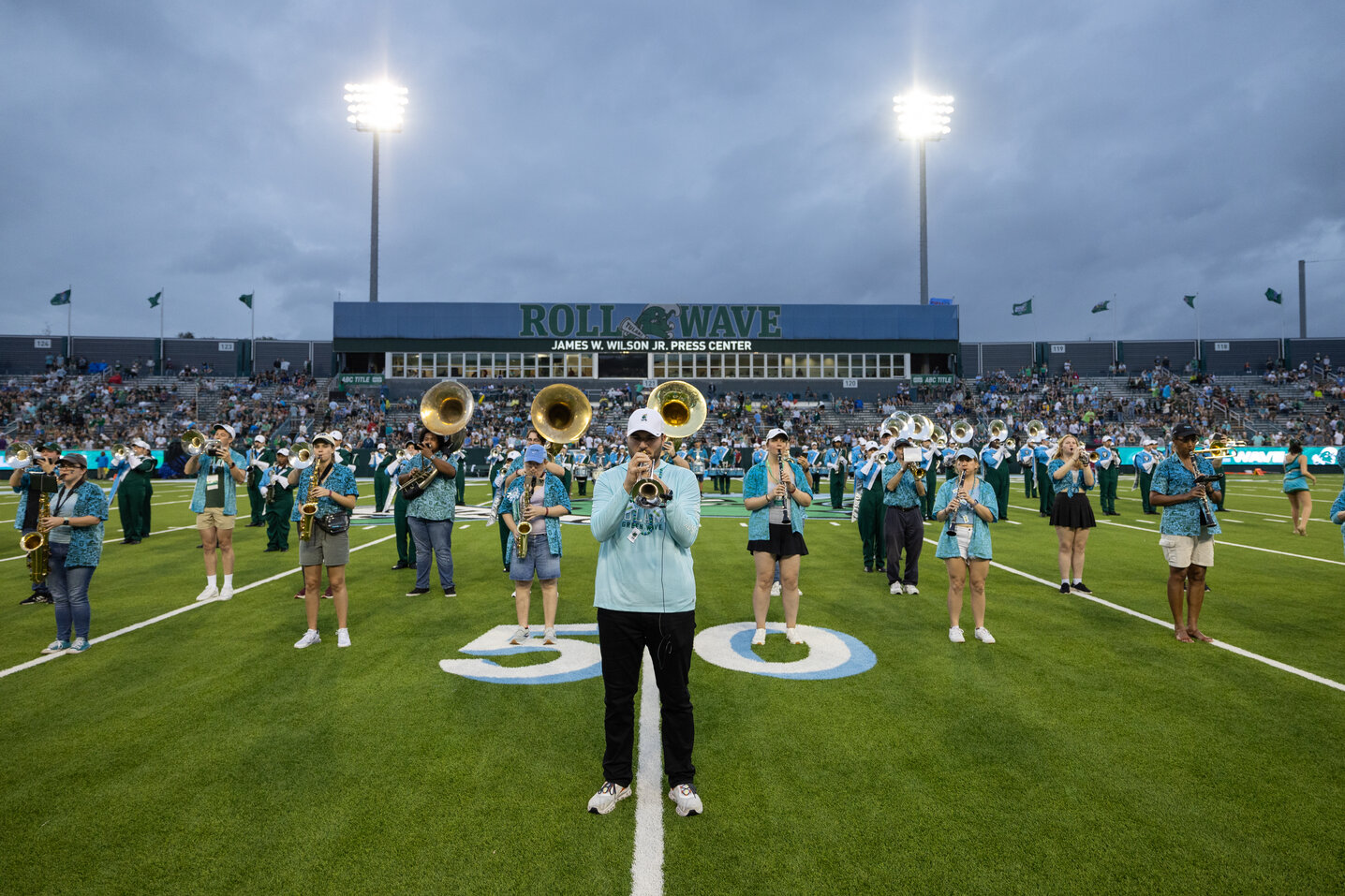 Guest trumpeter John Michael Bradford, MA ’24, performs a tribute to Louis Prima with the Tulane University Marching Band during the football halftime show at Homecoming. Photo by Kenny Lass, Tulane University Communications and Marketing, November 9, 2024, at Yulman Stadium.