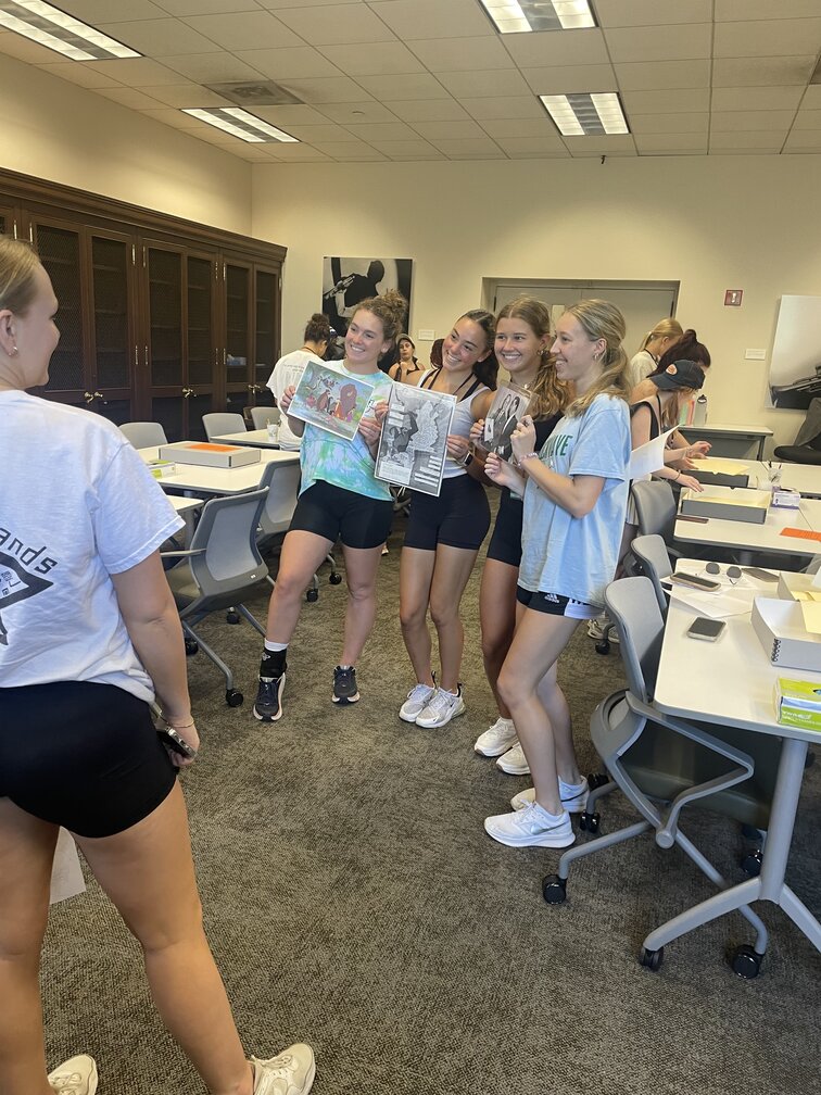 Tulane Bands students view archival materials from the Louis Prima papers during a workshop in the Louis Prima Room, the instruction classroom of Tulane University Special Collections. Photo by Melissa A. Weber, August 5, 2024.