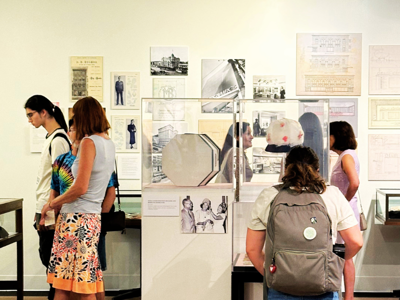 guests look into display cases