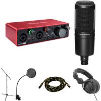"Image displays most pieces of the podcasting/recording kit, including a FocusRite preamp, an Audio-Techica microphone, a mic stand, pop filter, AV cables, and studio headphones."