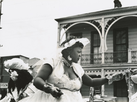 Woman at the Zulu Parade, 1954, New Orleans, Ralston Crawford collection of New Orleans jazz photographs, Tulane University Special Collections