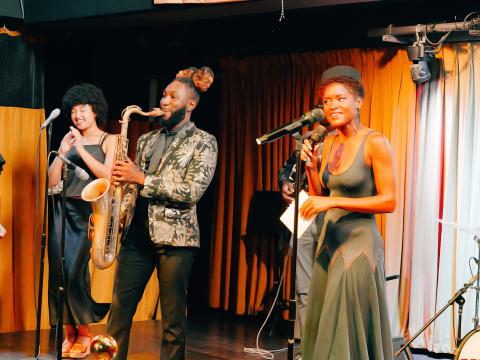 Performers with the Legends of the Dew Drop Inn: Road to Rock & Roll musical include (left to right) vocalist Jaudai Vappie, saxophonist Gladney, guitarist Arnold Little III, and actress/narrator Tanyell Quian.